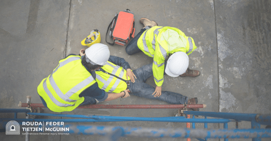 OSHA worker holding hard hat